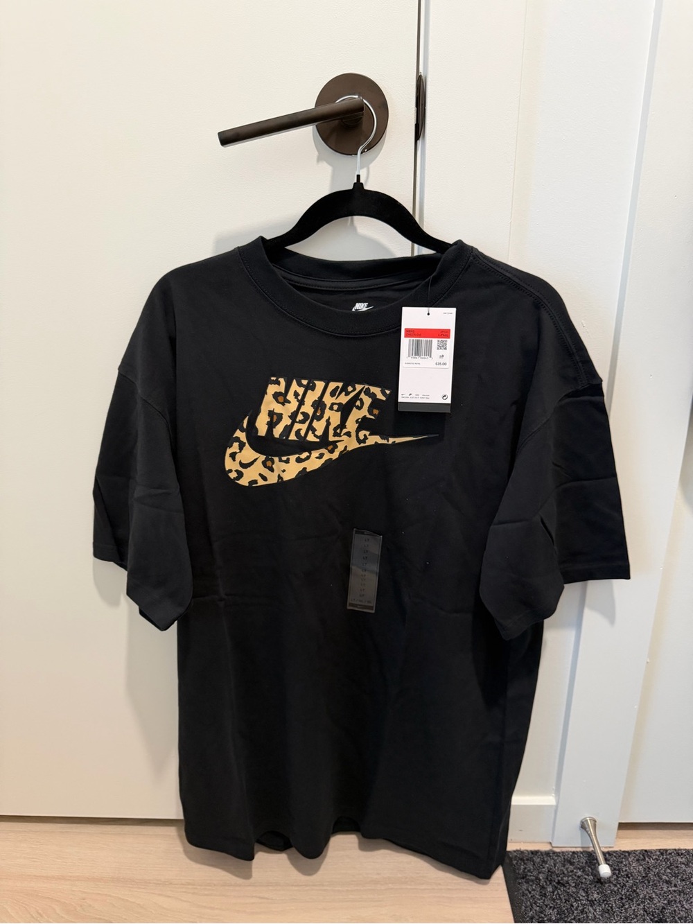 Nike Black Short Sleeve Tee with Leopard Swoosh
